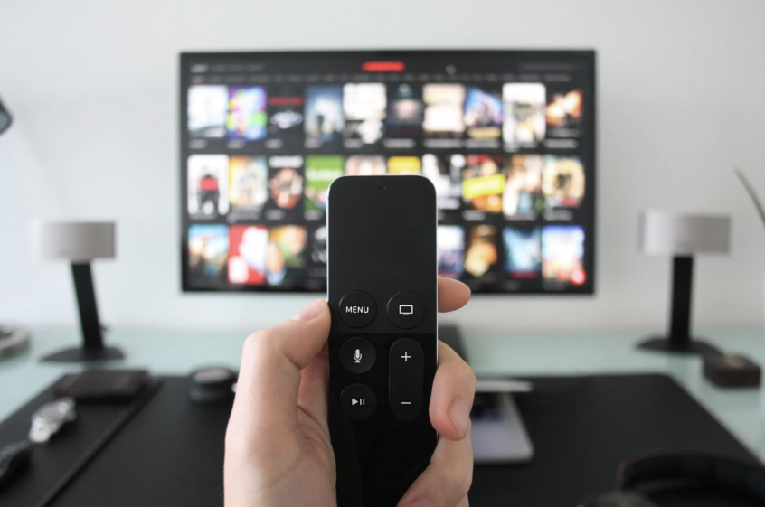 Viewer using a remote to recreate cable channel lineup options on a streaming TV interface.