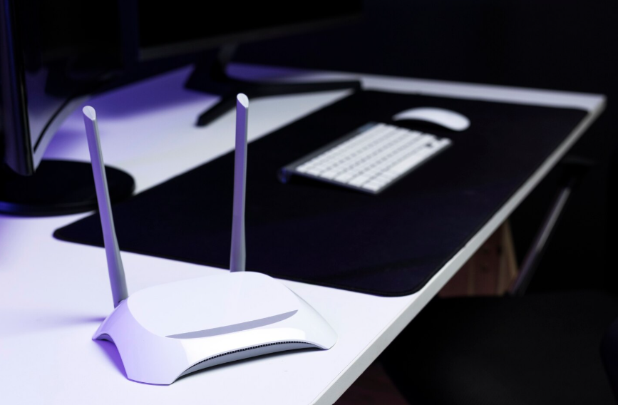 Wi-Fi router beside a home entertainment setup for stable streaming speeds.