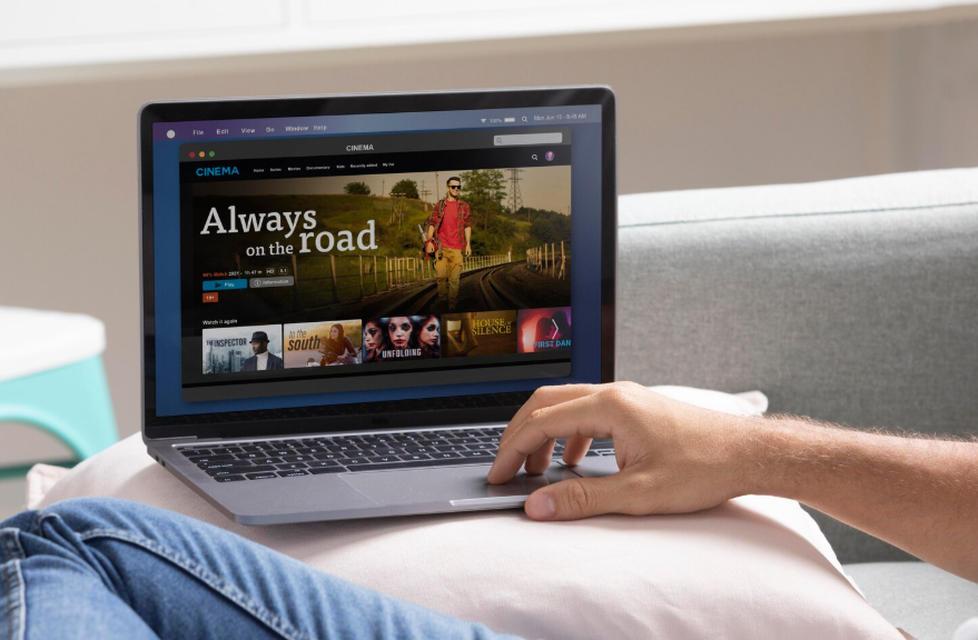 Laptop showing a streaming platform for comparing ad-supported streaming plans.