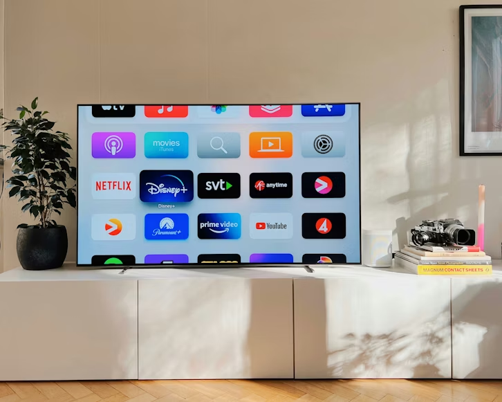 Smart TV showing a streaming stack of apps for replacing cable with streaming services at home.