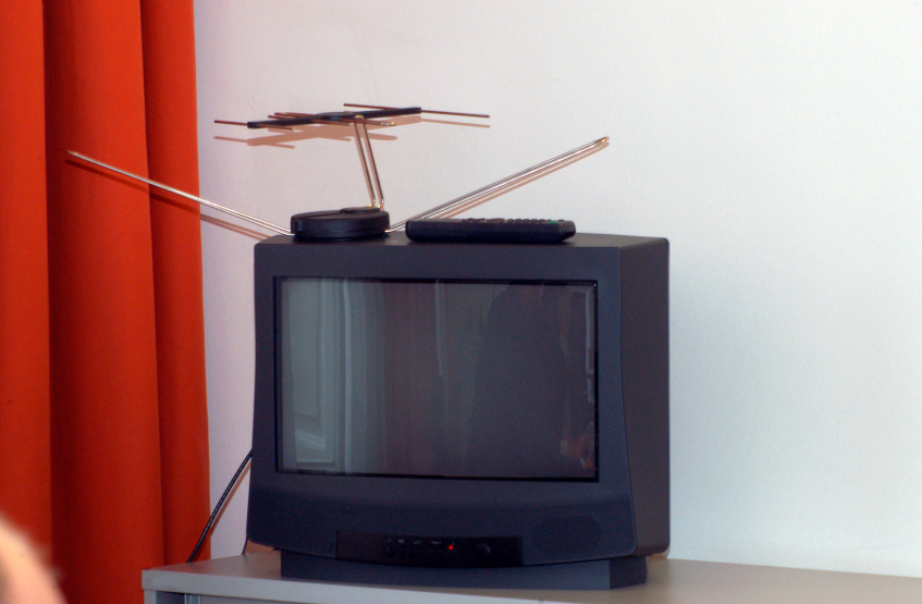 Indoor antenna set up to keep local channels without cable for free over-the-air TV.